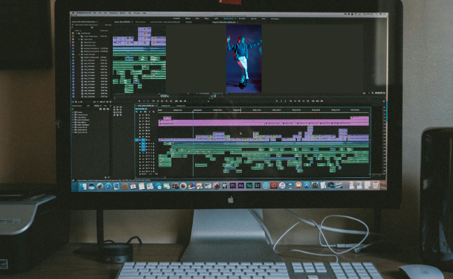 Desktop screen displaying a detailed video editing timeline with vertical video format, optimized for YouTube Shorts, Instagram Reels, and TikTok as part of professional video editing services.