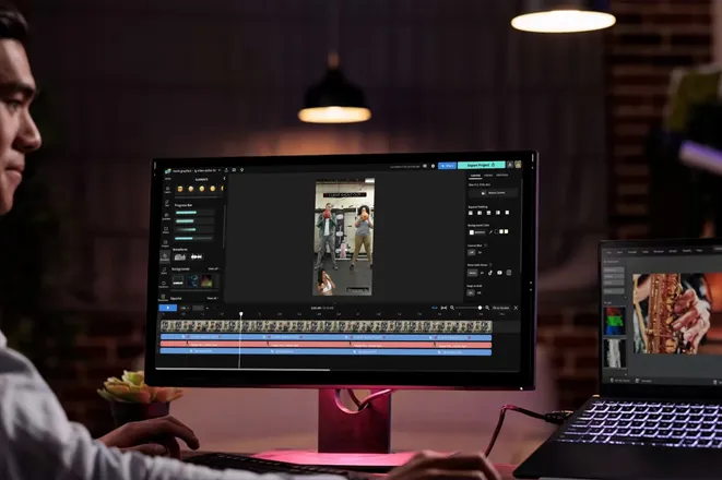 Editor creating vertical short-form video content on a desktop screen, optimizing Instagram Reels and TikTok clips for business marketing using professional video editing services