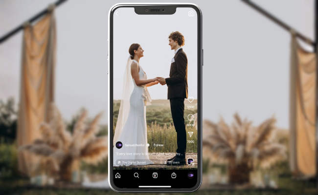 Vertical wedding video of a bride and groom holding hands displayed on a smartphone screen, showcasing short-form social media content optimized for Instagram Reels and YouTube Shorts.